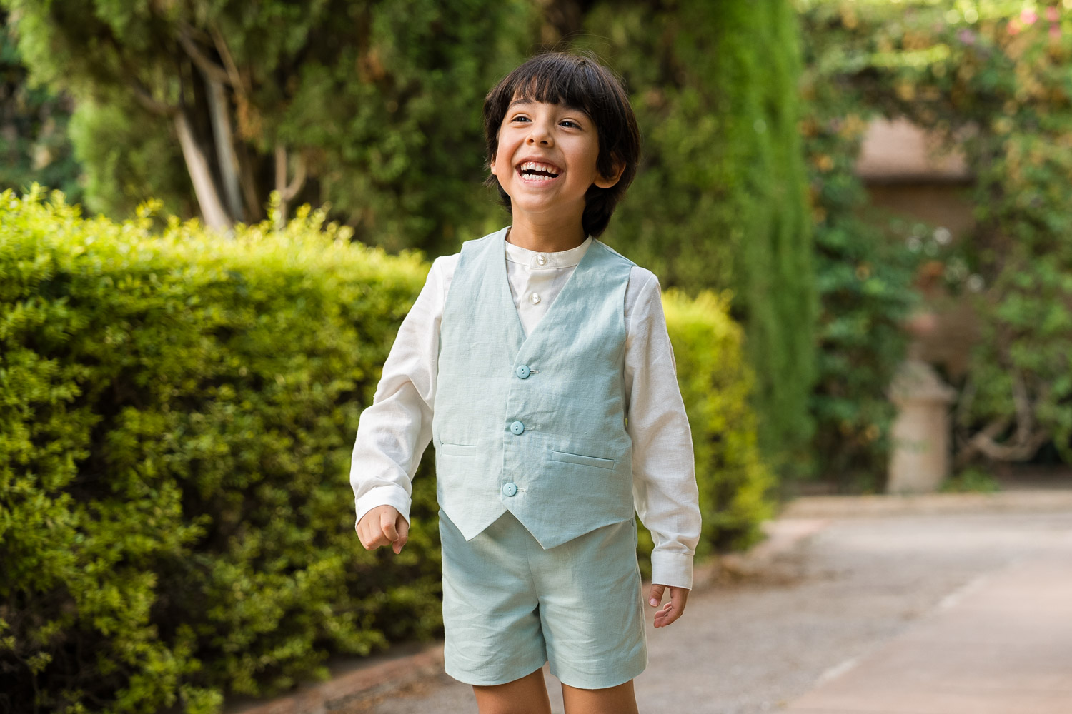niño ríe en Jardines de Monforte de Valencia